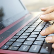 Fingers on keyboard