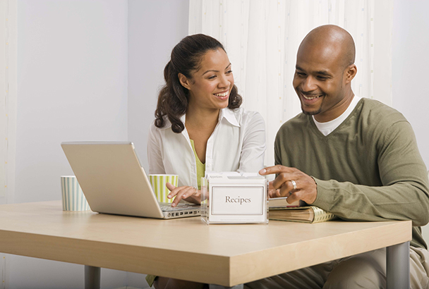 couple looking at recipes online.