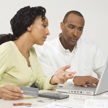 couple paying a bill online